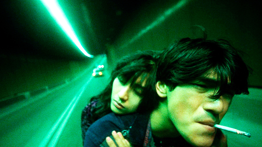 He Zhiwu and Agent on motorcycle